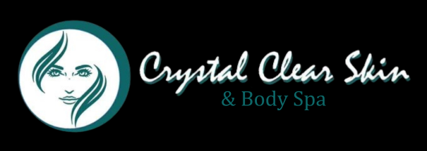 The logo for crystal clear skin and body spa shows a woman 's face in a circle.